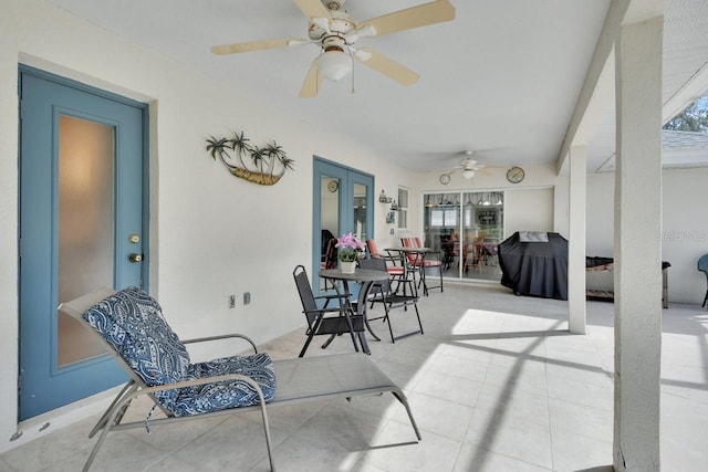 view of patio with ceiling fan