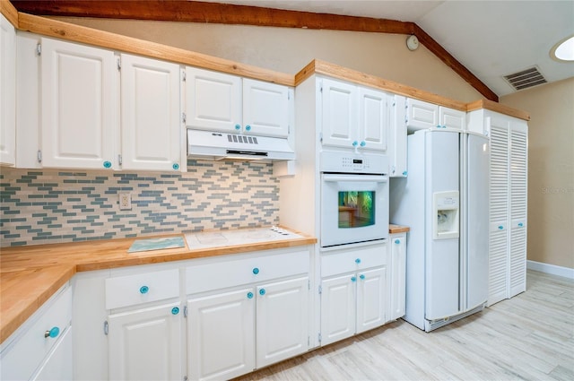 kitchen with white cabinetry, lofted ceiling with beams, white appliances, light hardwood / wood-style floors, and decorative backsplash