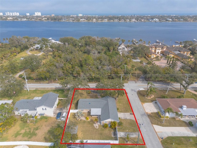 birds eye view of property featuring a water view