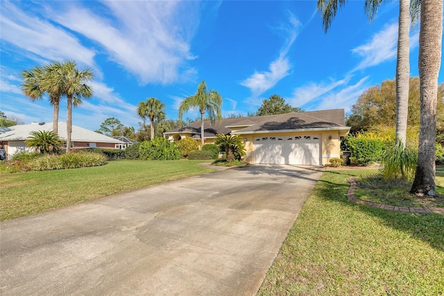 ranch-style home with a garage and a front yard