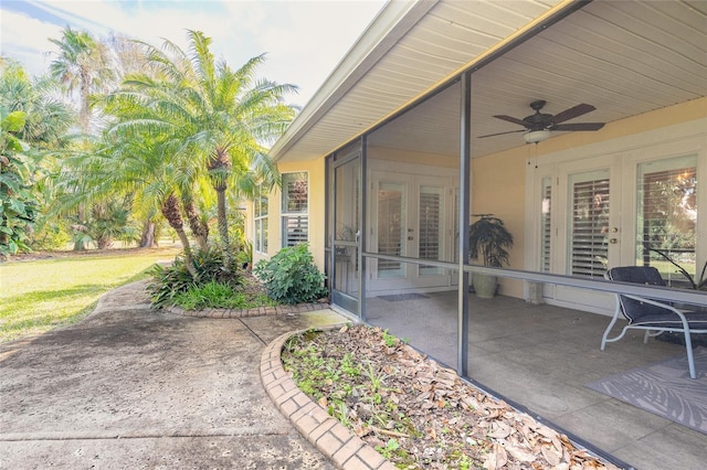 view of patio / terrace with french doors and ceiling fan