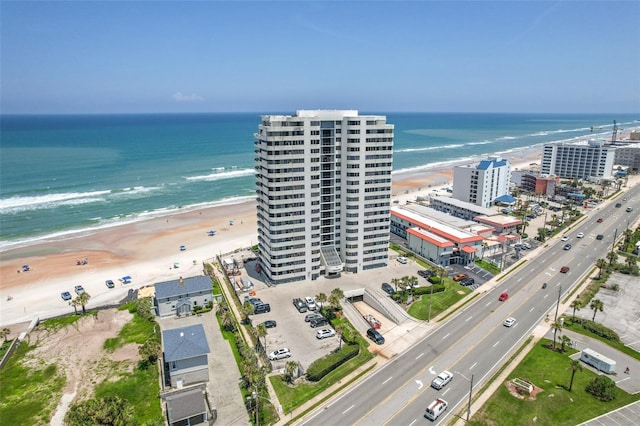 aerial view featuring a water view and a view of the beach