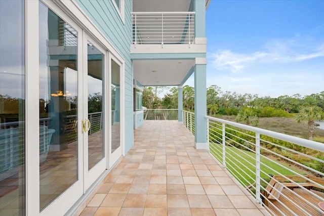 balcony featuring french doors