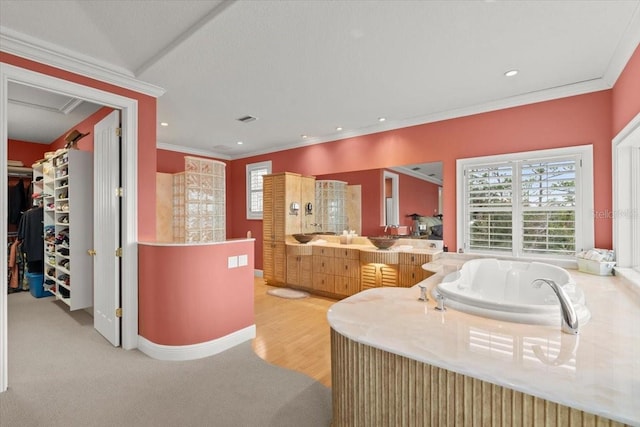 bathroom featuring ornamental molding, independent shower and bath, and vanity