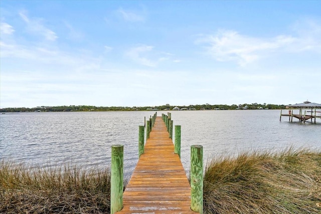 view of dock with a water view