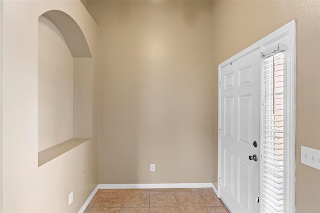 view of tiled foyer entrance