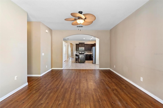 interior space featuring ceiling fan and light hardwood / wood-style floors