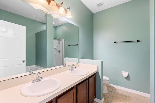 full bathroom featuring vanity, separate shower and tub, tile patterned floors, and toilet