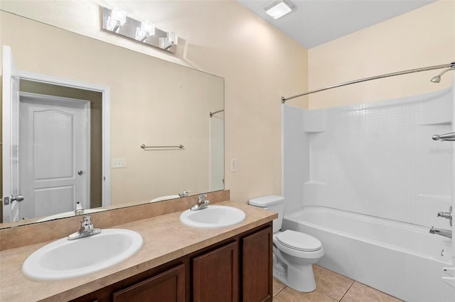 full bathroom with tile patterned flooring, shower / tub combination, vanity, and toilet