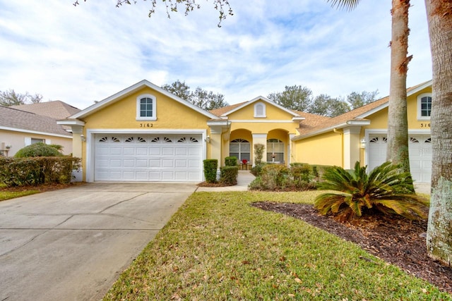 ranch-style house featuring a garage