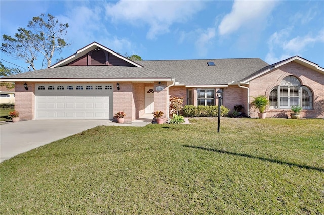 ranch-style house with a garage and a front yard