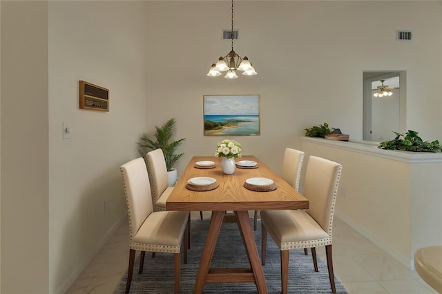 dining space with a chandelier