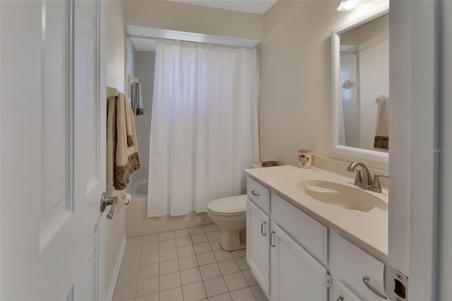 full bathroom featuring shower / bathtub combination with curtain, tile patterned floors, toilet, and vanity