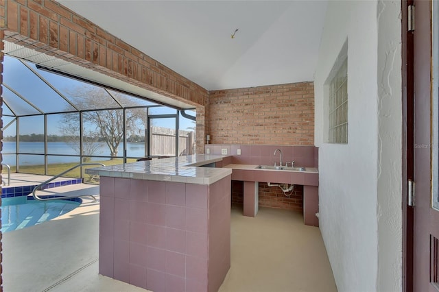 interior space featuring sink and a water view