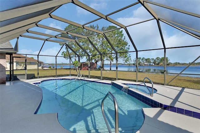 view of pool featuring a patio area, a water view, glass enclosure, a yard, and an in ground hot tub