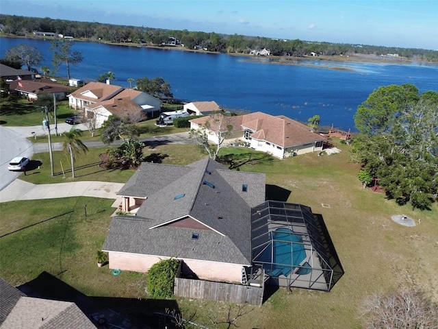 drone / aerial view with a water view