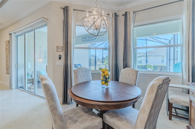 dining space featuring an inviting chandelier, ornamental molding, and light tile patterned floors