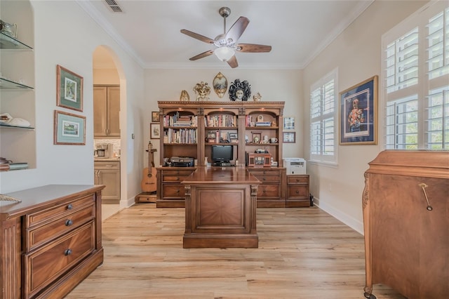 office area with ornamental molding, ceiling fan, and light wood-type flooring