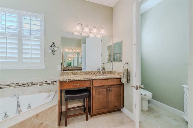 bathroom featuring vanity, toilet, tile patterned flooring, and tiled tub