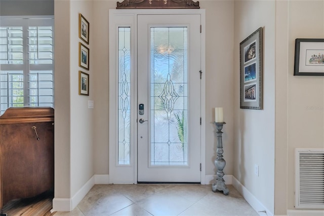 entrance foyer featuring light tile patterned flooring