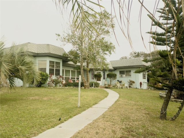 exterior space with a front lawn