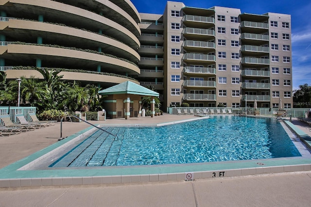 view of pool featuring a patio