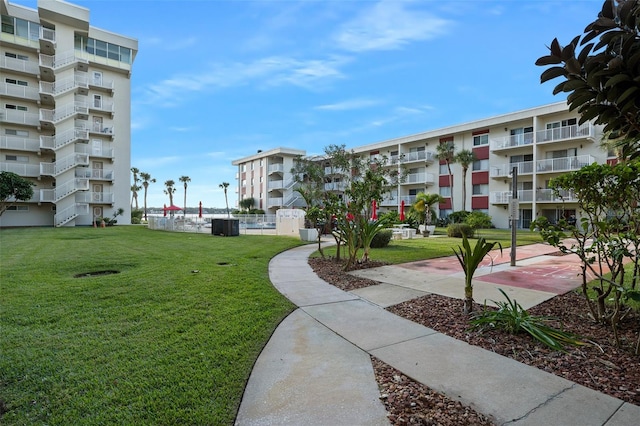 surrounding community featuring a yard