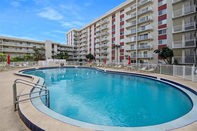 view of swimming pool with a patio area