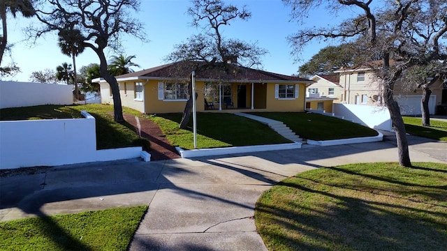 view of front of house with a front lawn