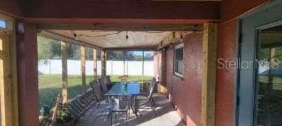 unfurnished sunroom featuring plenty of natural light