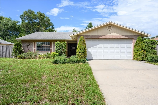 ranch-style house with a garage and a front yard