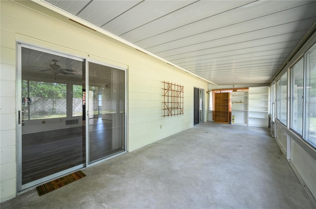 unfurnished sunroom with a healthy amount of sunlight