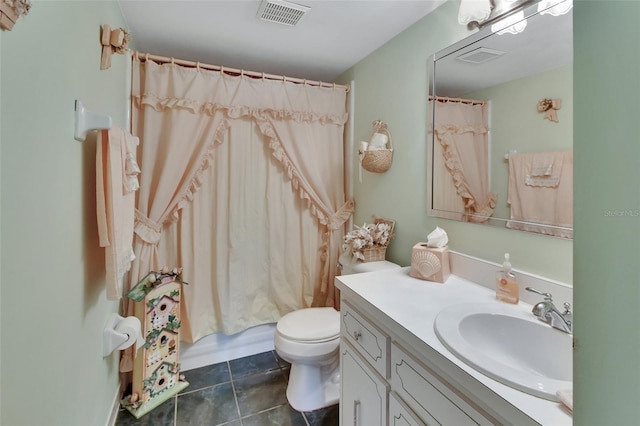 full bathroom featuring shower / tub combo with curtain, vanity, toilet, and tile patterned flooring