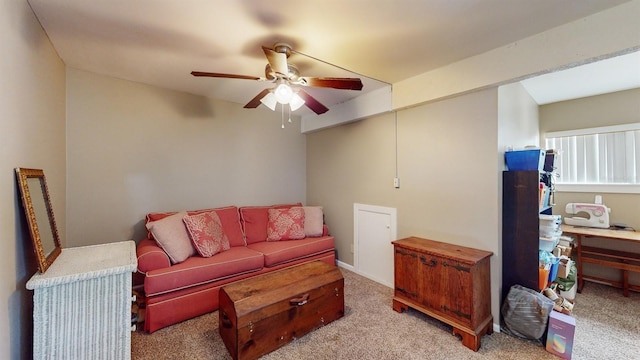 living room featuring light carpet and ceiling fan