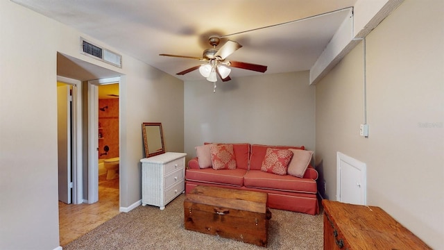 living room with light carpet and ceiling fan