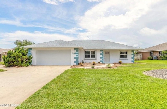 ranch-style home featuring a garage and a front yard