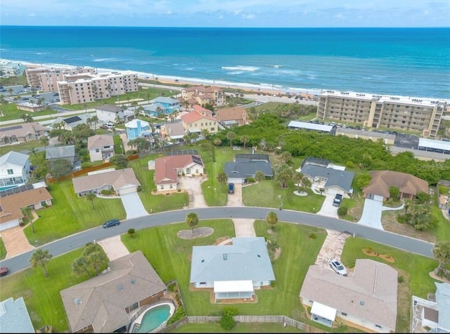 aerial view with a beach view and a water view