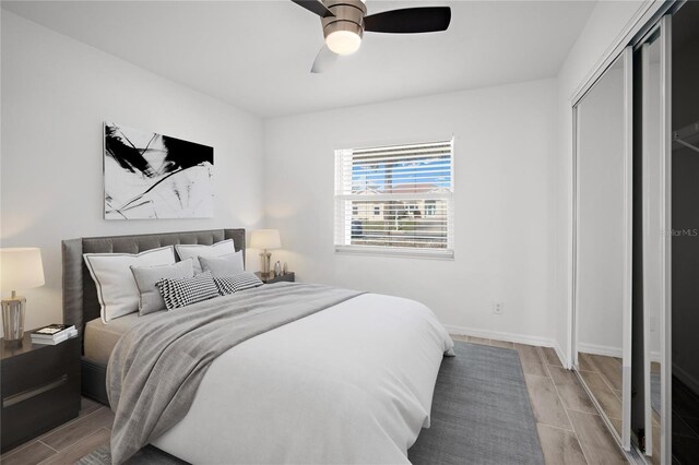 bedroom with a closet and ceiling fan