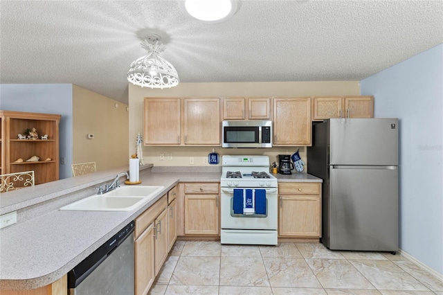 kitchen with decorative light fixtures, sink, kitchen peninsula, stainless steel appliances, and light brown cabinets