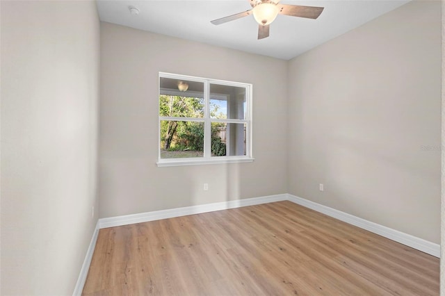 unfurnished room featuring light hardwood / wood-style floors and ceiling fan