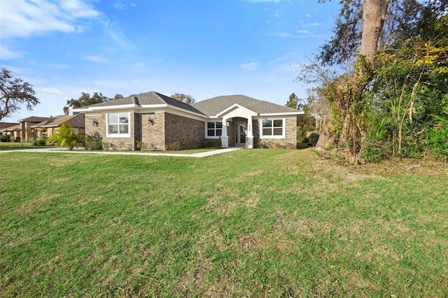 ranch-style house with a front yard