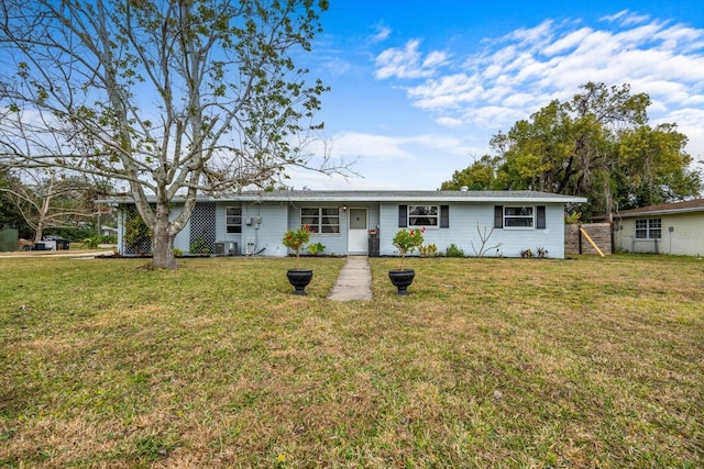 ranch-style house with a front yard