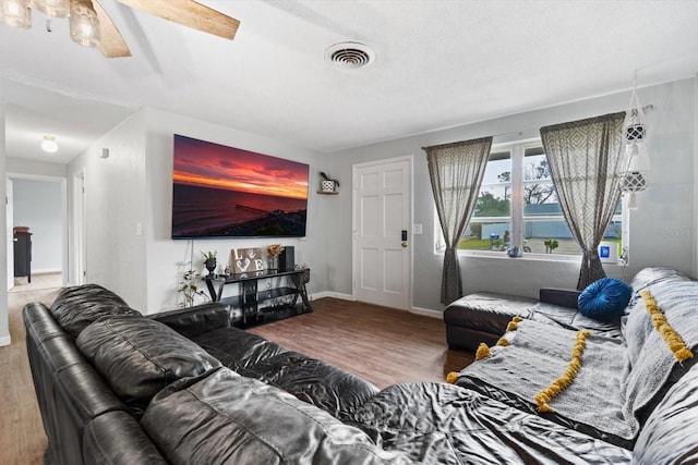 living room with hardwood / wood-style flooring