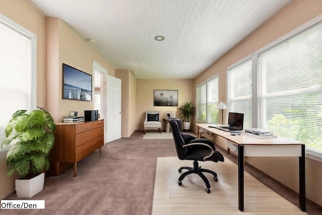 office area with light colored carpet and wooden ceiling