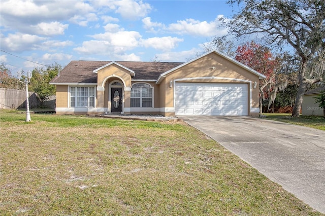 ranch-style home featuring a garage and a front lawn