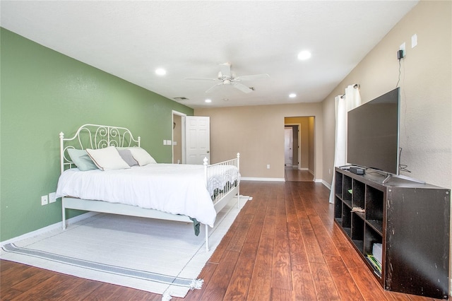 bedroom featuring dark wood-type flooring and ceiling fan