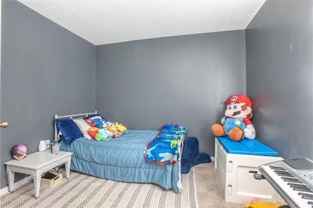 bedroom with light colored carpet