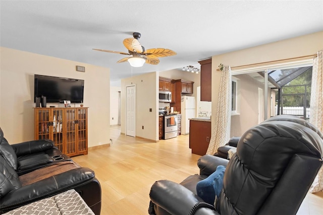 living room with ceiling fan