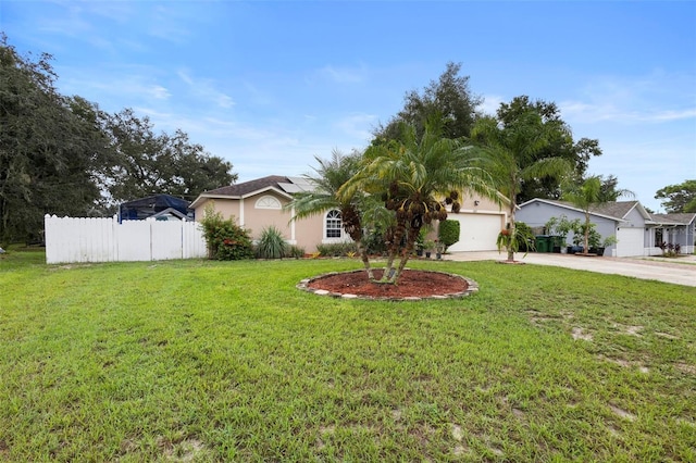 single story home featuring a garage and a front yard