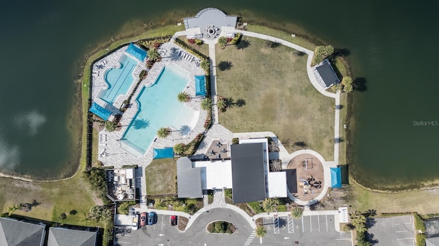 bird's eye view with a water view